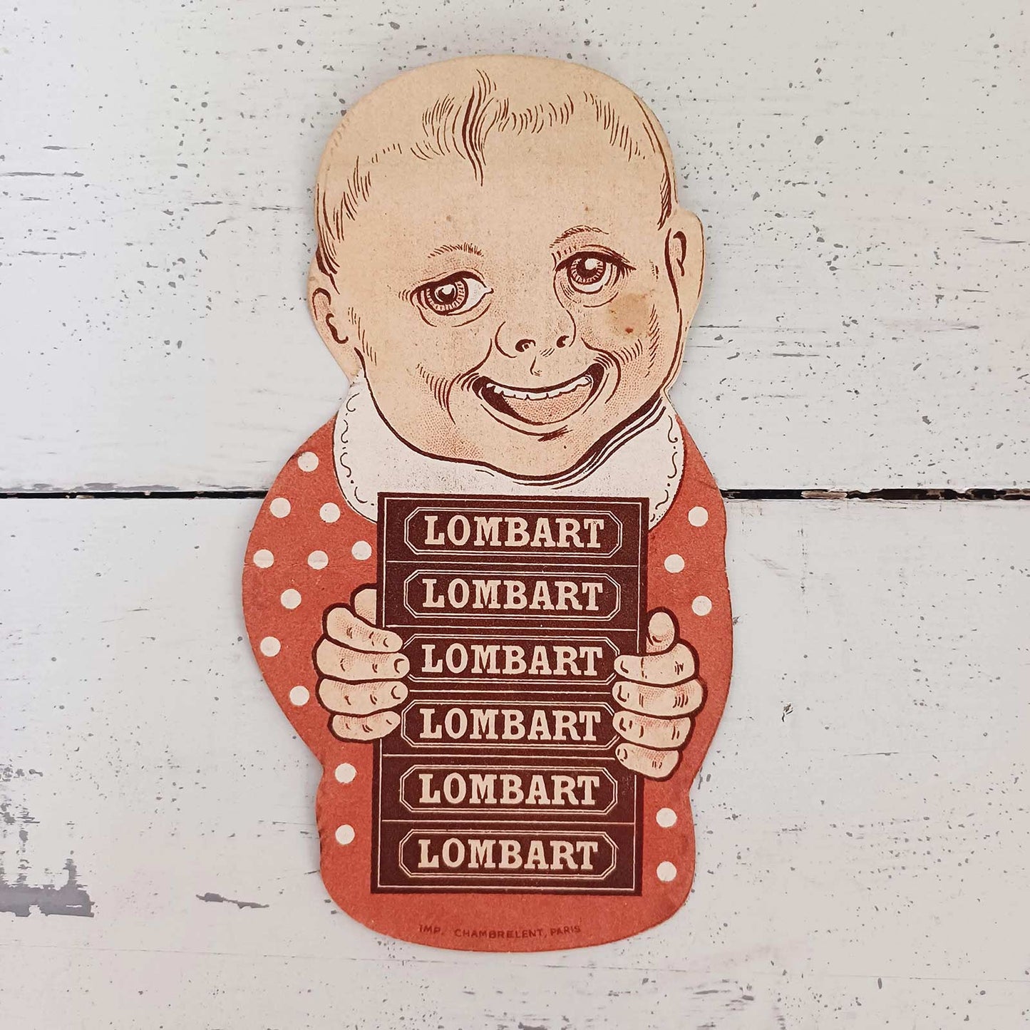 Petit dépliant publicitaire humoristique en papier cartonné pour le chocolat Lombart, en très bon état général.