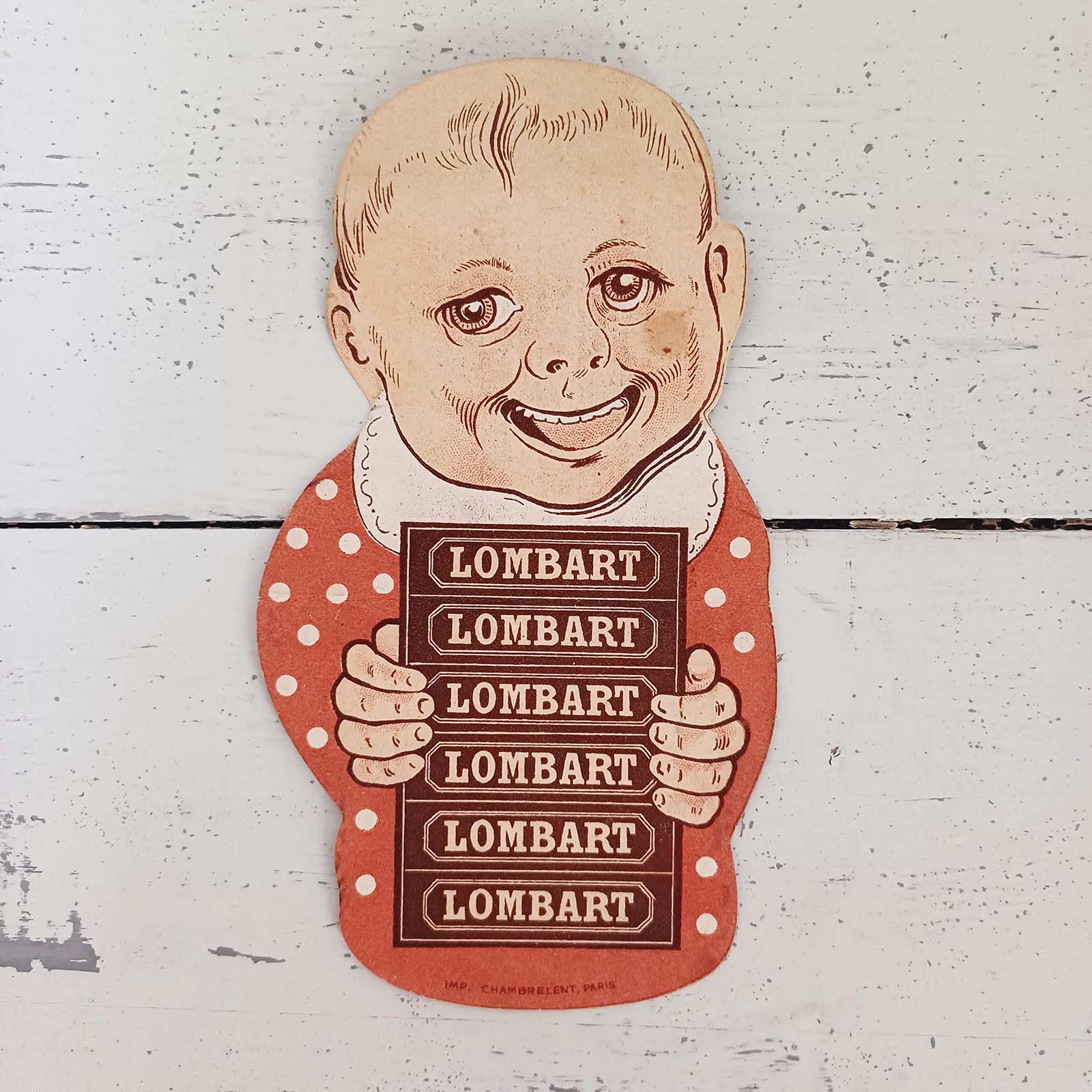 Petit dépliant publicitaire humoristique en papier cartonné pour le chocolat Lombart, en très bon état général.