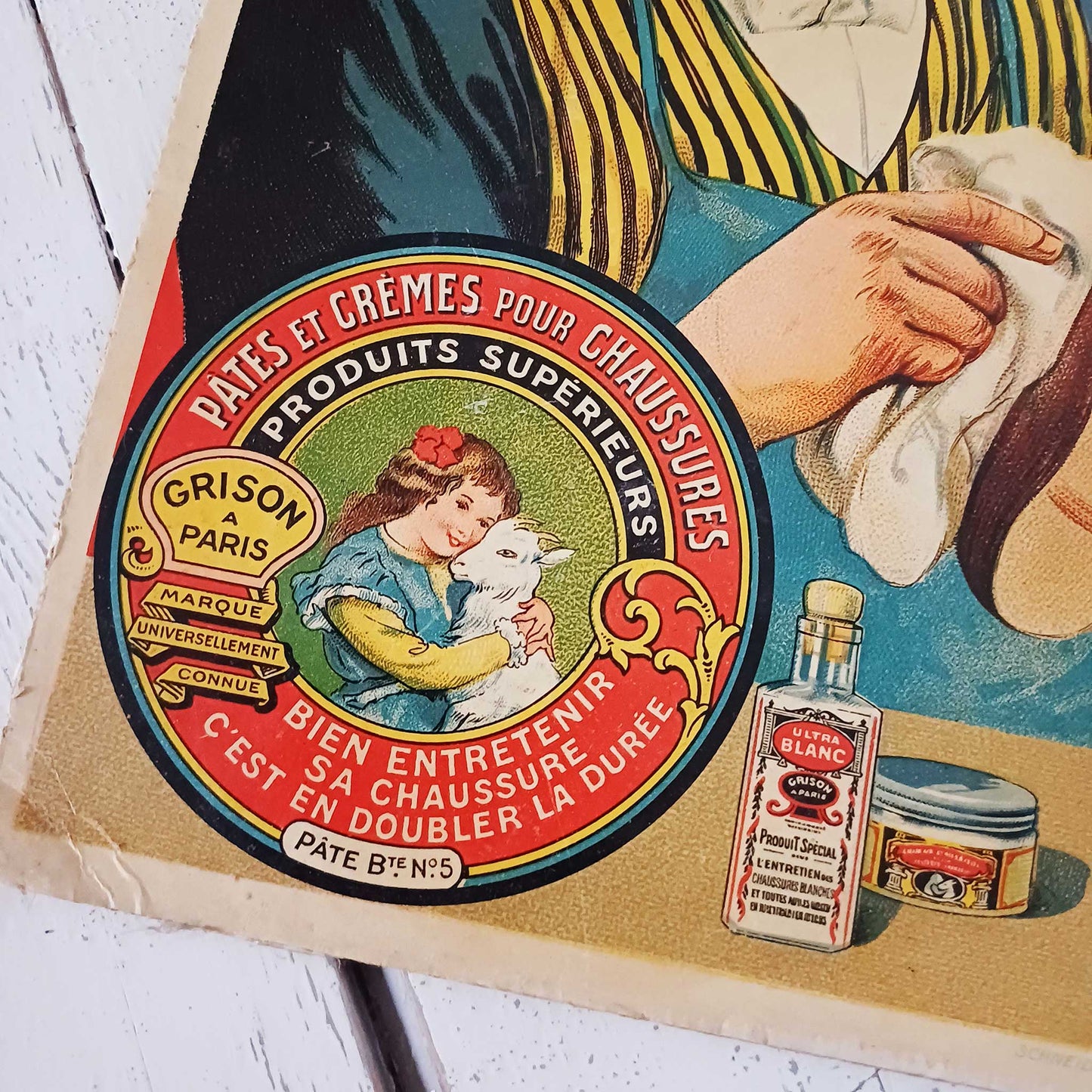 Publicité carton pour la crème de chaussure Grison à Paris