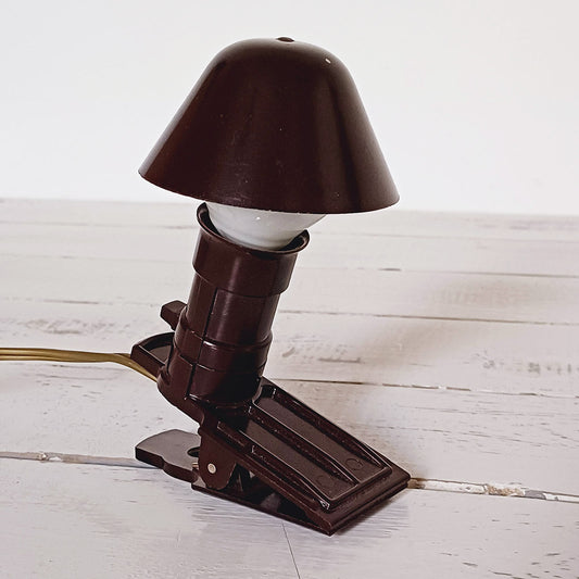 Lampe champignon ancienne en bakélite avec pince, format 13,5 x 7 x 9 cm, en très bon état et fonctionnelle.