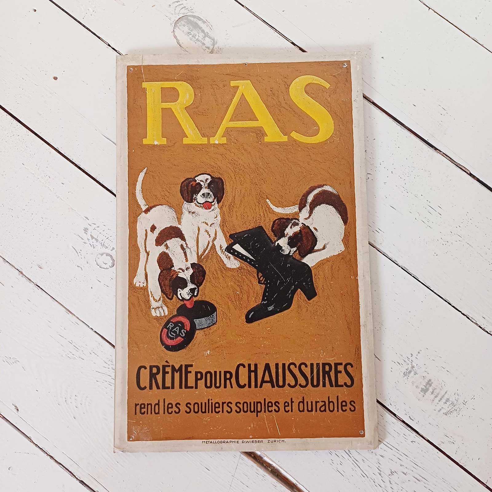 Tôle lithographiée emboutie pour le cirage RAS, signée Emil Cardinaux, publicité 1910 rare.